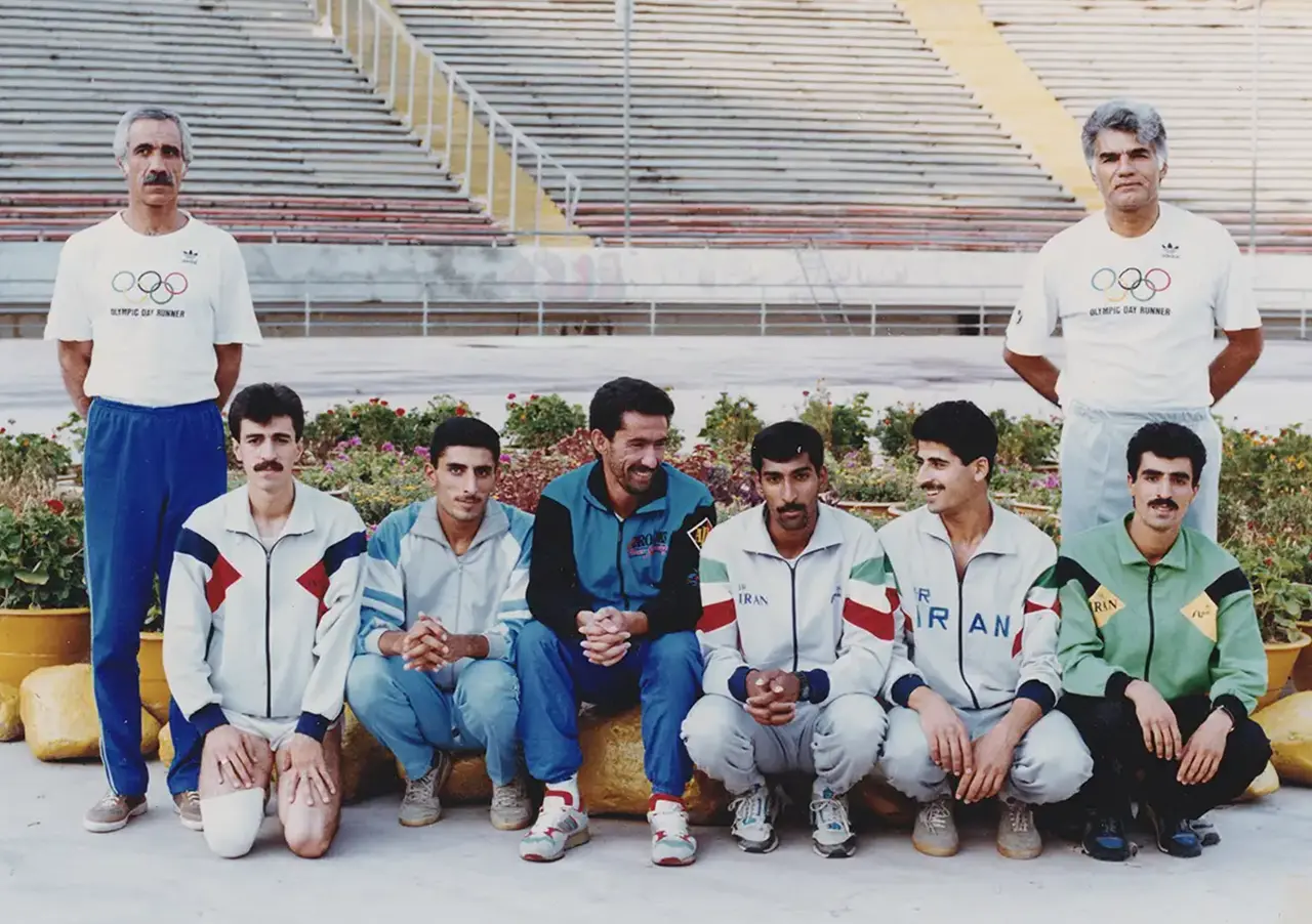 Manouchehr Shamshiri with Iran's national athletics team and coaching staff